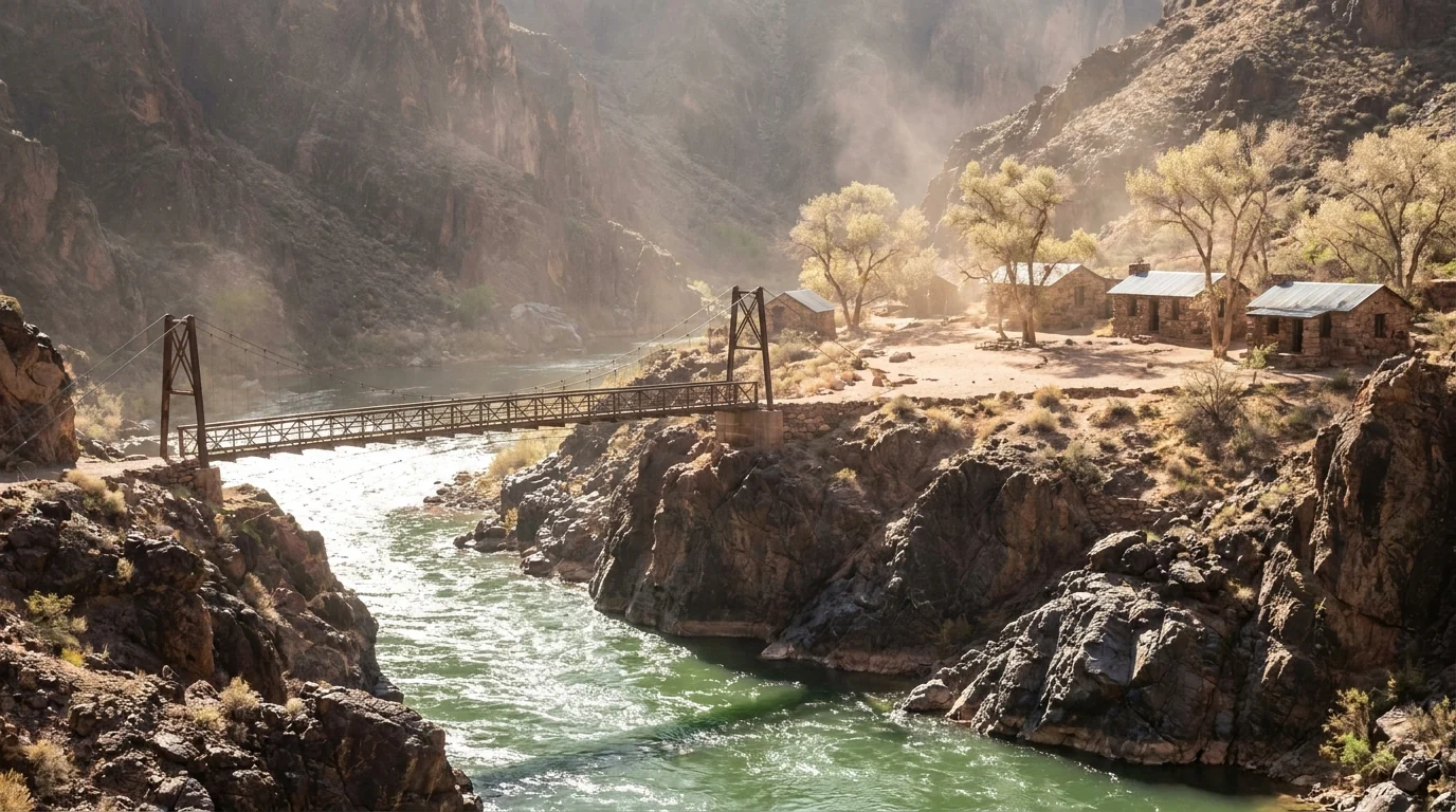 Jade-green Colorado River cutting through dark ancient schist walls, a footbridge and a cluster of stone cabins and cottonwoods on a sandy bench, harsh bright canyon-bottom light and heat shimmer, inner gorge near Phantom Ranch Grand Canyon, ultrarealistic photograph representative of the region
